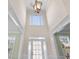 Two story foyer with chandelier and hardwood floors at 3419 Concord Loop, Atlanta, GA 30349