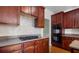 Kitchen detail with gas cooktop and double oven at 3419 Concord Loop, Atlanta, GA 30349