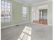 Bright living room with neutral carpet, and hardwood floors at 3419 Concord Loop, Atlanta, GA 30349