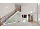 View of staircase leading to upper level from Gathering room at 3419 Concord Loop, Atlanta, GA 30349
