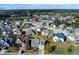 Aerial view of the neighborhood showcasing manicured lawns, tree lined streets and well-maintained homes at 108 Laurel Bay Se Dr, Loganville, GA 30052