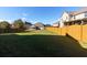 Large, fenced backyard with well-maintained lawn, perfect for outdoor activities and entertaining at 108 Laurel Bay Se Dr, Loganville, GA 30052