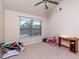 Bedroom with vaulted ceilings and large window allowing ample natural light into the room at 108 Laurel Bay Se Dr, Loganville, GA 30052