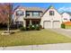 Two-story brick home with a two-car garage and manicured lawn at 108 Laurel Bay Se Dr, Loganville, GA 30052