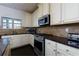 A kitchen showcasing stainless steel appliances, granite countertops, and ample cabinet space at 108 Laurel Bay Se Dr, Loganville, GA 30052