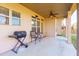 A covered patio featuring a grill, seating area, and view of the yard at 108 Laurel Bay Se Dr, Loganville, GA 30052