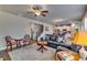 Spacious living room open to kitchen, featuring hardwood floors and comfortable seating at 7214 Gladstone Cir, Stonecrest, GA 30038