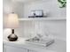 Built-in shelving featuring decorative items and accent lighting at 496 Overbrook Nw Dr, Atlanta, GA 30318