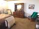 Spacious bedroom with dresser and rocking chair at 6656 Mitchell Sw Ln, Mableton, GA 30126