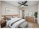 Cozy bedroom with hardwood floors and a stylish bench offers a relaxing retreat at 2627 Elsinore St, East Point, GA 30344