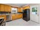 Functional kitchen with granite countertops, stainless steel appliances, and modern backsplash at 2627 Elsinore St, East Point, GA 30344