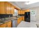 Well-equipped kitchen with stainless steel appliances, granite countertops, and modern backsplash at 2627 Elsinore St, East Point, GA 30344