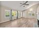 Bright living room with hardwood floors, vaulted ceilings, and large windows at 2627 Elsinore St, East Point, GA 30344
