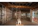 Unfinished interior of a room under construction, showing framing and windows at 4445 Beechnut Cir, Cumming, GA 30028