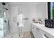 This bathroom features a modern shower with unique tile and a sleek vanity with black hardware at 2716 Ridgewood Nw Rd, Atlanta, GA 30327