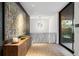 Elegant foyer with modern lighting, console table, and artwork creating a welcoming entrance at 2716 Ridgewood Nw Rd, Atlanta, GA 30327