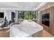 Bright modern kitchen with an oversized waterfall island, stainless steel hood, and lots of natural light at 2716 Ridgewood Nw Rd, Atlanta, GA 30327