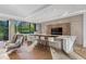 Modern kitchen with an island, bar stools, stainless steel appliances, and hardwood floors at 2716 Ridgewood Nw Rd, Atlanta, GA 30327