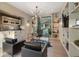 Contemporary home office with built-in shelving, modern desk and wet bar area at 2716 Ridgewood Nw Rd, Atlanta, GA 30327