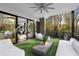 Relaxing patio overlooking the trees and natural landscape, with an entrance to the living room at 2716 Ridgewood Nw Rd, Atlanta, GA 30327