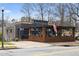 The Marlay restaurant with brick patio and American flag at 315 W Benson St, Decatur, GA 30030