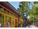 The Beer and Dove and other shops line a tree-lined street at 315 W Benson St, Decatur, GA 30030