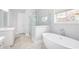 Spa-like bathroom featuring a soaking tub and walk-in shower at 3909 Collarton Close Se, Smyrna, GA 30080
