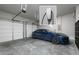 Garage with Tesla charger and additional storage shelving at 3909 Collarton Close Se, Smyrna, GA 30080