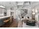 Open concept Gathering room with hardwood floors and staircase view at 3909 Collarton Close Se, Smyrna, GA 30080