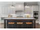 Modern kitchen with gray cabinetry and large island at 3909 Collarton Close Se, Smyrna, GA 30080