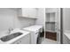 Laundry room with washer, dryer, and extra storage at 3909 Collarton Close Se, Smyrna, GA 30080