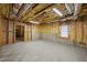 Unfinished basement with exposed framing and plumbing at 3830 High Point Cir, Cumming, GA 30041