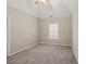 Spacious bedroom with carpeted floor and ceiling fan at 3830 High Point Cir, Cumming, GA 30041