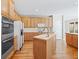 Kitchen with stainless steel appliances and hardwood floors at 3830 High Point Cir, Cumming, GA 30041