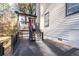 Back deck with stairs leading to the house entrance at 3193 Deshong Dr, Stone Mountain, GA 30087