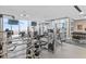 Well-equipped fitness center featuring modern exercise machines and natural light at 855 Peachtree St # 2205, Atlanta, GA 30308