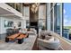 Modern living room with high ceilings, expansive windows, and contemporary furnishings at 855 Peachtree St # 2205, Atlanta, GA 30308