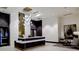 Refined lobby area with a reception desk, sleek chandelier, and decorative accents at 855 Peachtree St # 2205, Atlanta, GA 30308