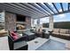 Stylish outdoor lounge with comfortable seating, a fireplace, and city views at 855 Peachtree St # 2205, Atlanta, GA 30308