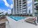 Resort-style pool area with lounge chairs and city views, perfect for relaxation at 855 Peachtree St # 2205, Atlanta, GA 30308