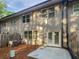 Backyard view showcases the siding, patio, and fenced yard at 3279 Wild Basil Ln, Buford, GA 30519