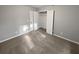 Bedroom featuring neutral carpet and closet with double doors, offering ample storage at 3279 Wild Basil Ln, Buford, GA 30519