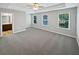Main bedroom featuring ample natural light and adjoined to the Primary bathroom at 3279 Wild Basil Ln, Buford, GA 30519