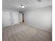 Large bedroom featuring plush carpeting, fresh neutral tones, and spacious closets at 504 Vicksburg Pl, Atlanta, GA 30350