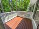 Cozy patio area surrounded by lush greenery for a private outdoor experience at 504 Vicksburg Pl, Atlanta, GA 30350