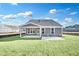 Backyard with new sod and patio at 112 Laurel Farms Ln, Dallas, GA 30157