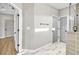Spa-like bathroom with a large walk-in shower and marble flooring at 112 Laurel Farms Ln, Dallas, GA 30157