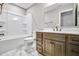 Bathroom with shower/tub combo and wood vanity at 112 Laurel Farms Ln, Dallas, GA 30157