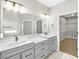 Double vanity bathroom with walk-in shower and separate soaking tub at 112 Laurel Farms Ln, Dallas, GA 30157