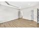 Large bedroom with hardwood floors and access to hallway bathroom at 112 Laurel Farms Ln, Dallas, GA 30157